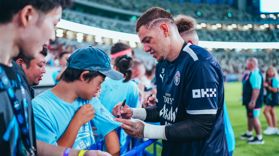 FANFARE: Ederson also took time out to sign autographs