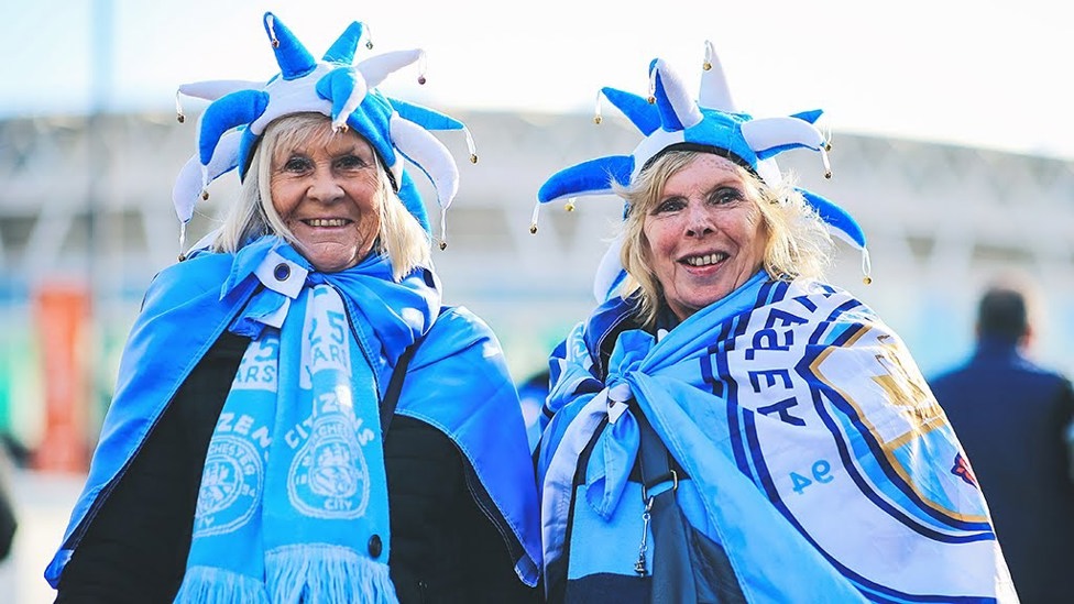 HATS THE WAY TO DO IT: Some nifty City headwear was the order of the day for these two ladies