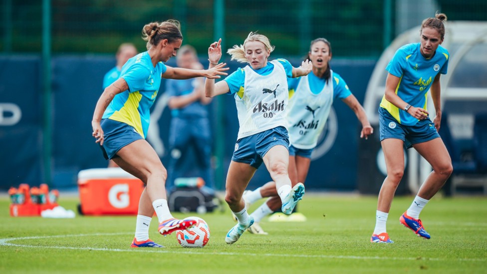 ACTION STATIONS: Kerstin Casperij, Chloe Kelly and Vivianne Miedema in the thick of things.