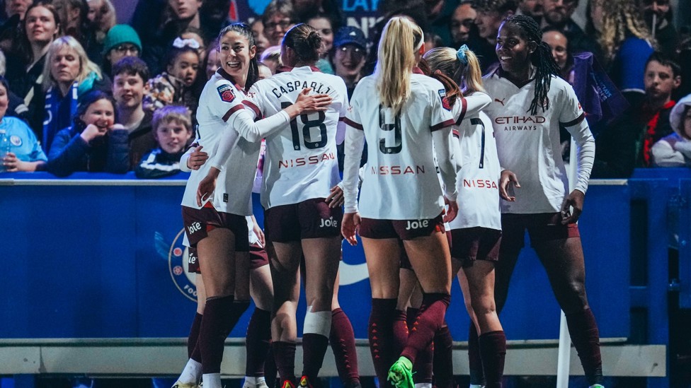 ALL TOGETHER NOW : The team congratulate Shaw on her decisive strike