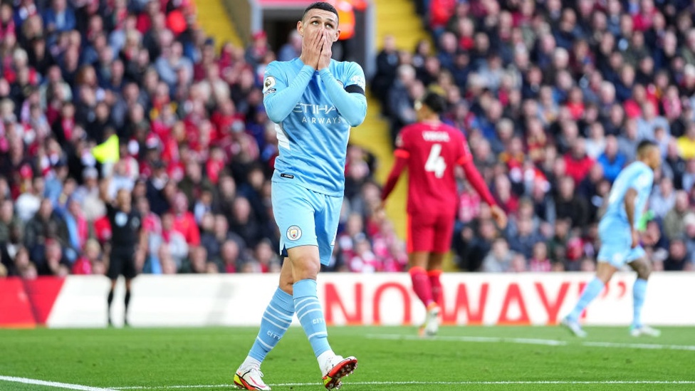 FO-DENIED : Phil reacts after Alisson's save from his goal-bound shot.