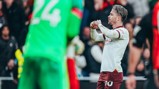 ONE LOVE: Grealish shows his love for the City fans.