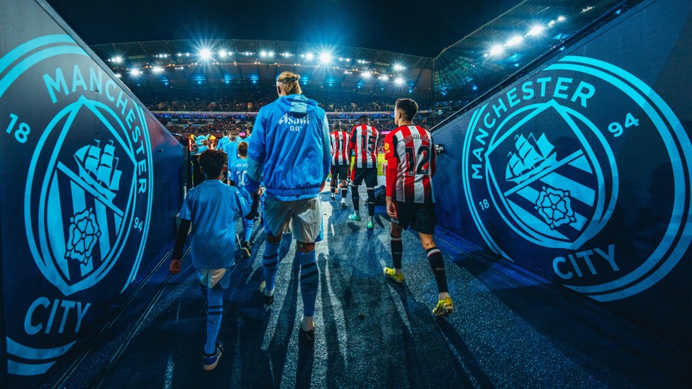 OUR HOME : Players emerge from the tunnel and into the Etihad