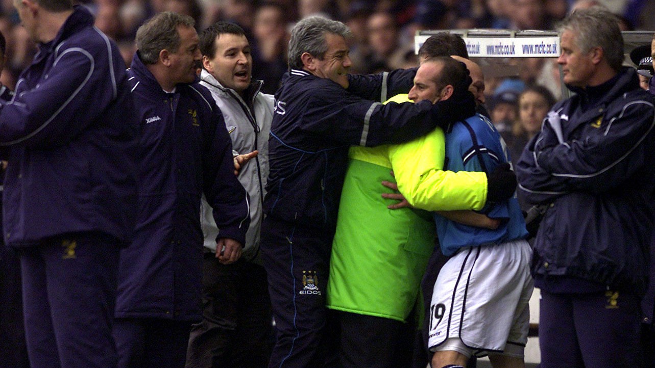 KING KEV : Kevin Keegan tries to calm Danny Tiatto after his red card, by Alex Livesey