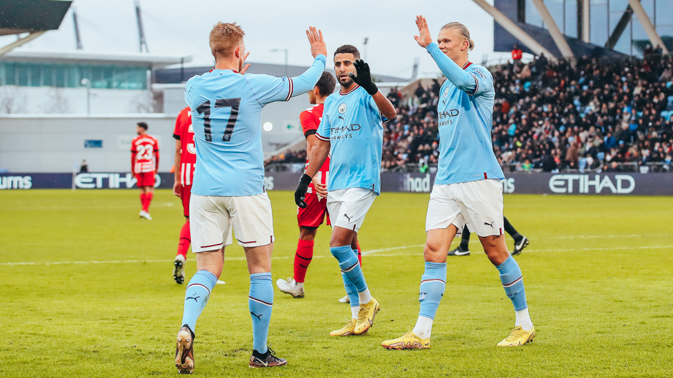 HIGH FIVES : Haaland, Mahrez and KDB celebrate after we double the lead.