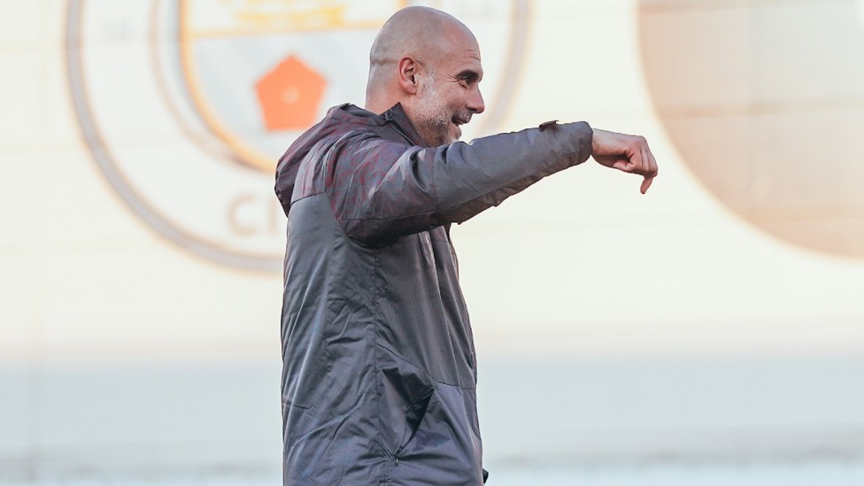 PEP TALK : The boss in good spirits ahead of the first stage of our FA Cup defence tomorrow