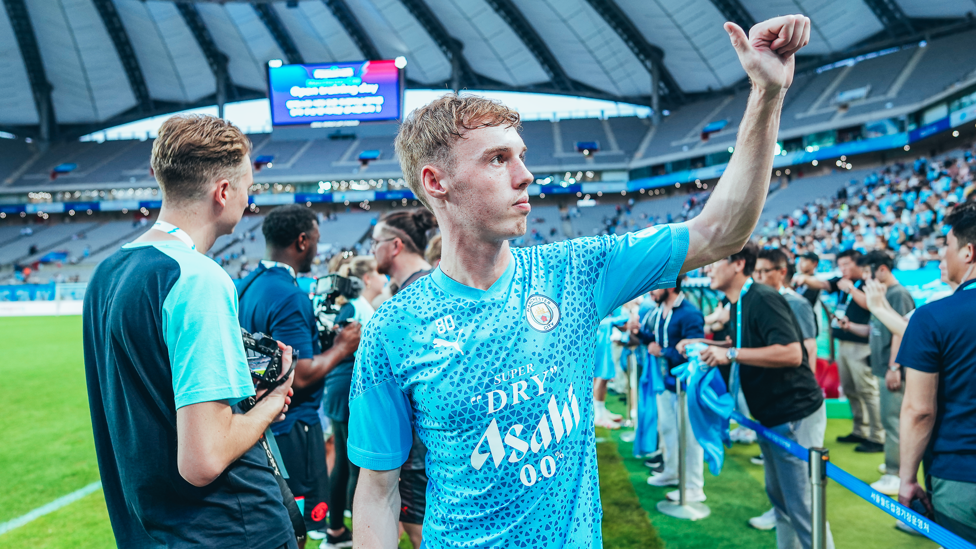 THUMBS UP: Cole Palmer acknowledges the Seoul fans