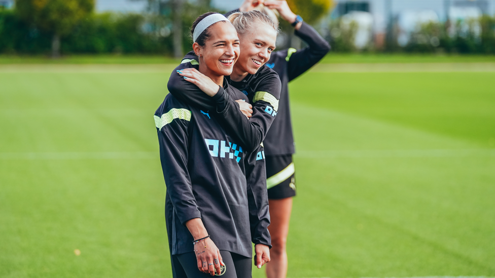 SIDE EYE : Esme Morgan catches our cameras over Deyna Castellanos' shoulder