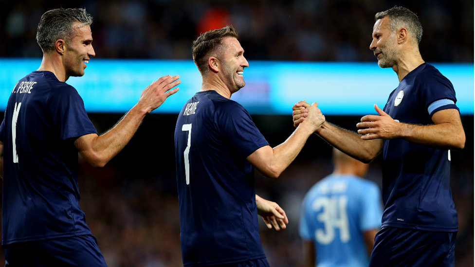 ALL LEVEL : Robbie Keane celebrates with Ryan Giggs and Robin van Persie after pulling one back for the PL All Stars