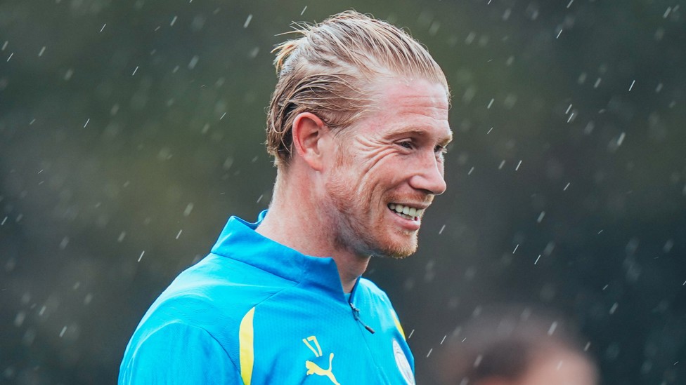 BRILLIANT BELGIAN  : De Bruyne braves the Manchester rain.