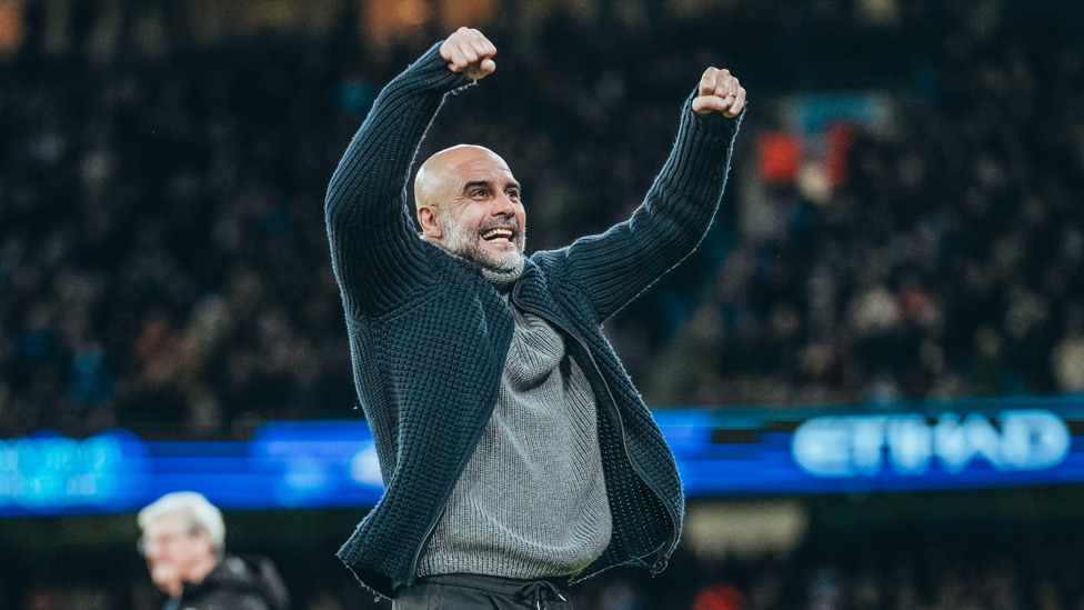 TOUCHLINE CELEBRATIONS: Pep Guardiola celebrates Rico Lewis' goal