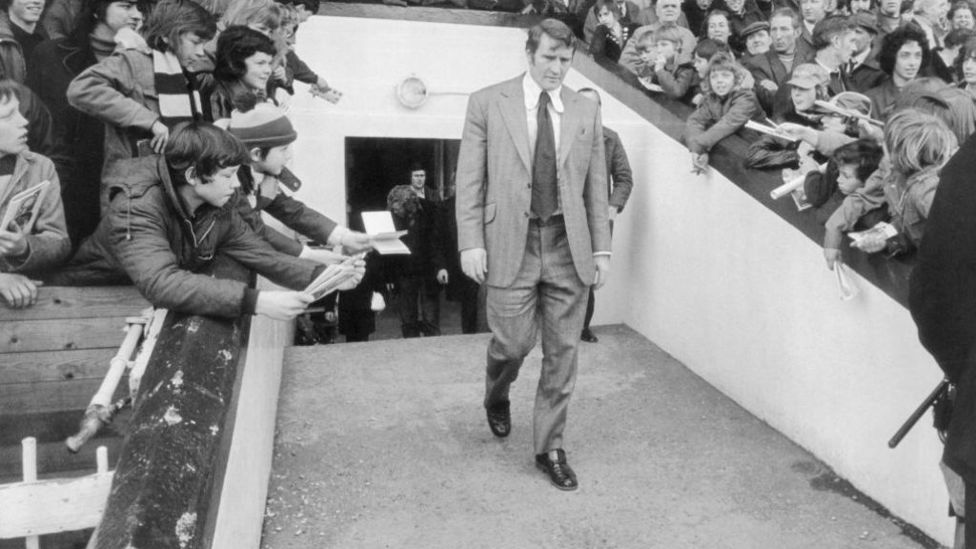 MAINE MAN: Malcolm is deep in thought as he walks out at Maine Road