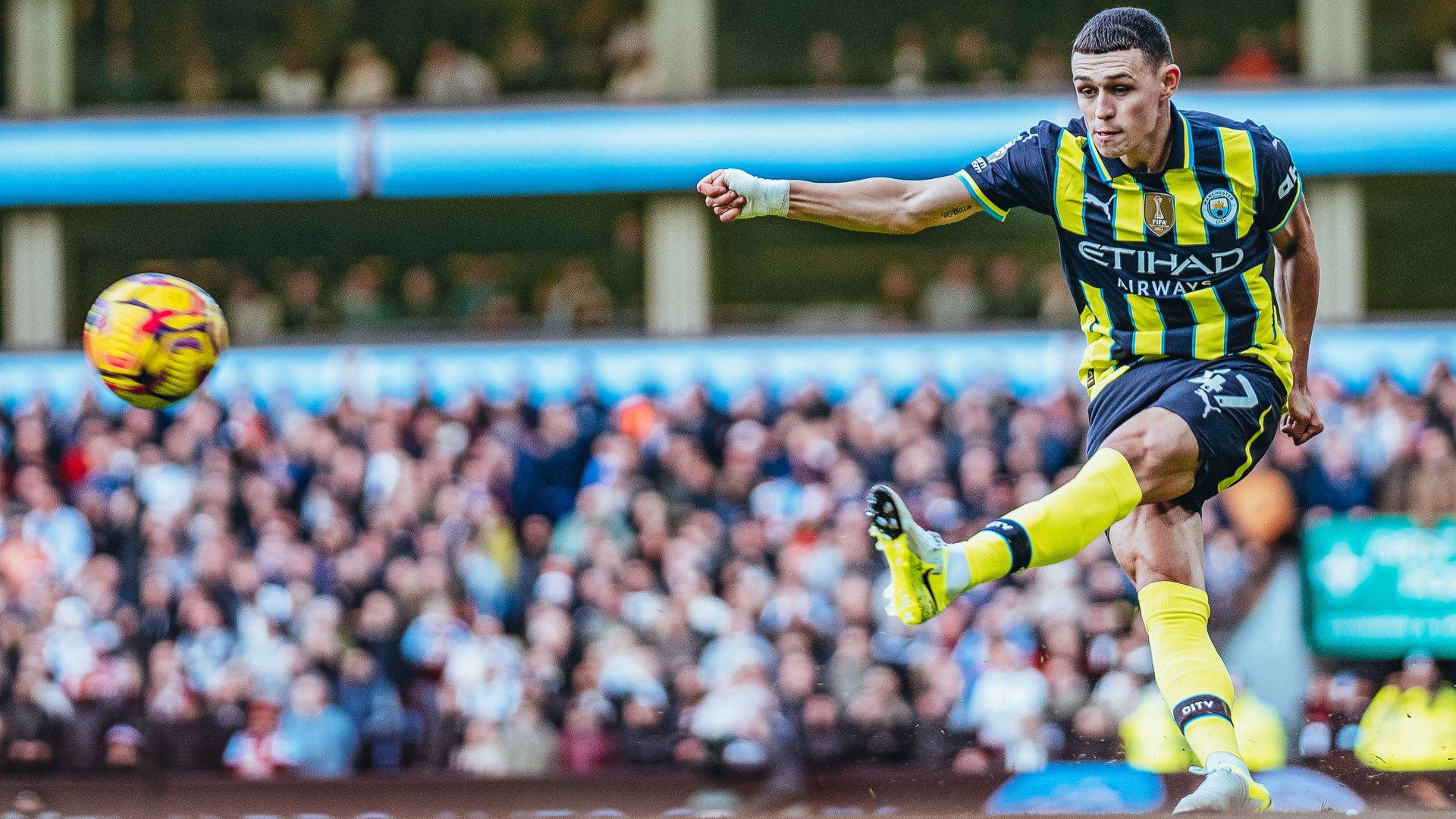 TAKE THAT: Phil Foden tries his luck from outside the box.