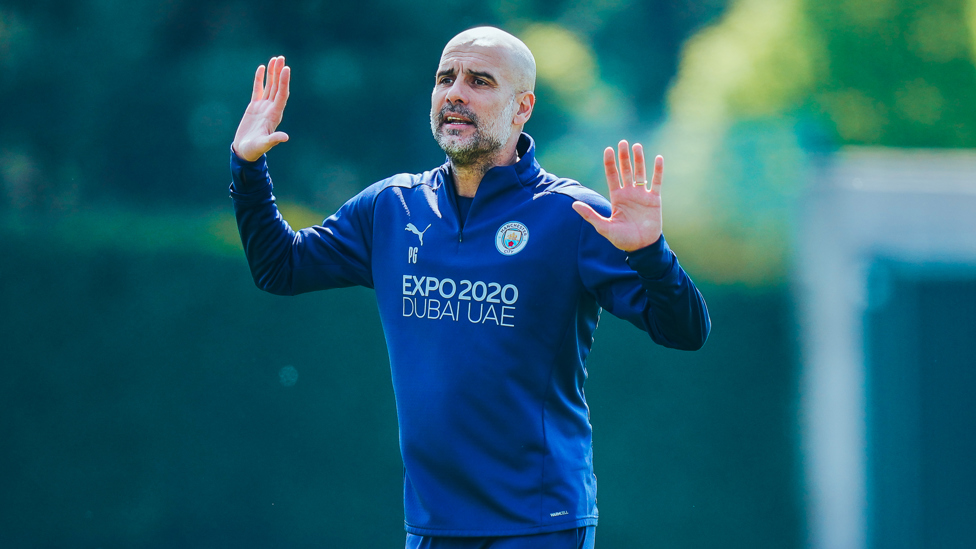 THE BOSS: Pep Guardiola gets his point across to the City players