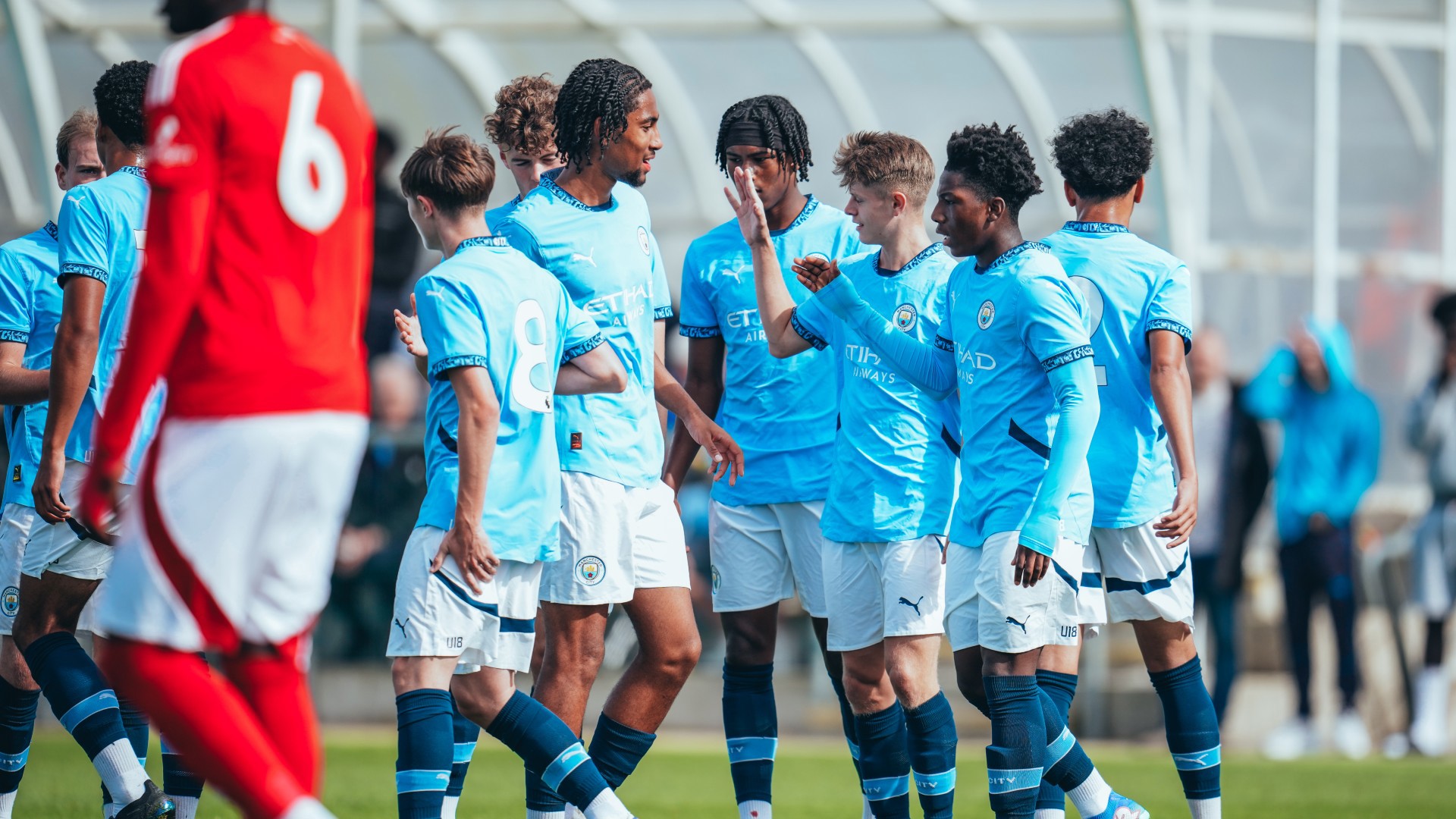 TOGETHER : The team celebrate Ryan McAidoo's goal. 