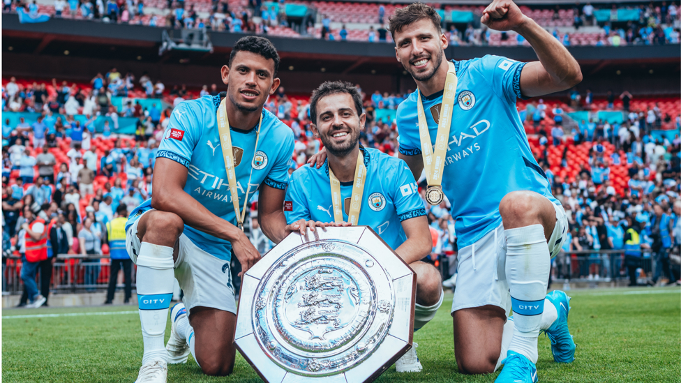 PORTUGAL'S FINEST : Nunes, Bernardo and Dias pose with the trophy.