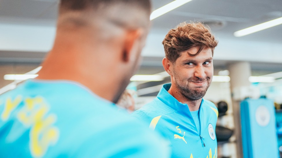 CHEEKY : John Stones tries to contain his laughter.