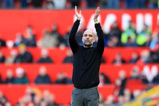 Pep Guardiola salutes the fans