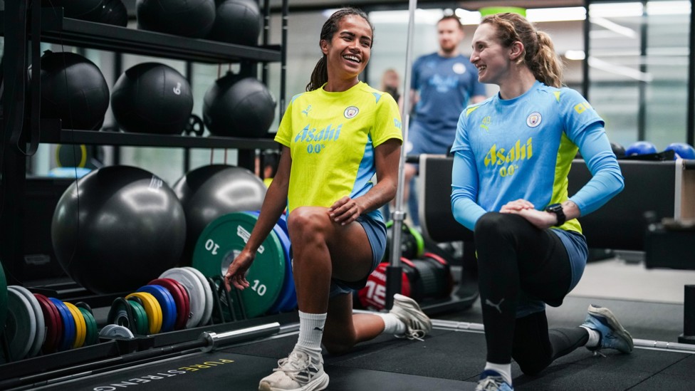 STRETCHING OUT : Mary Fowler and Katie Startup share a joke while warming up