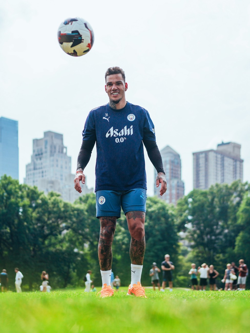 EYES ON THE PRIZE : Ederson brings the ball under control