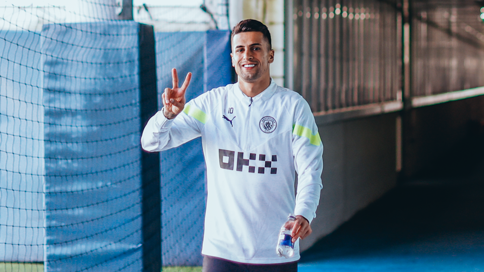 PEACE OUT : Joao Cancelo looks relaxed heading into training after netting against Southampton last weekend