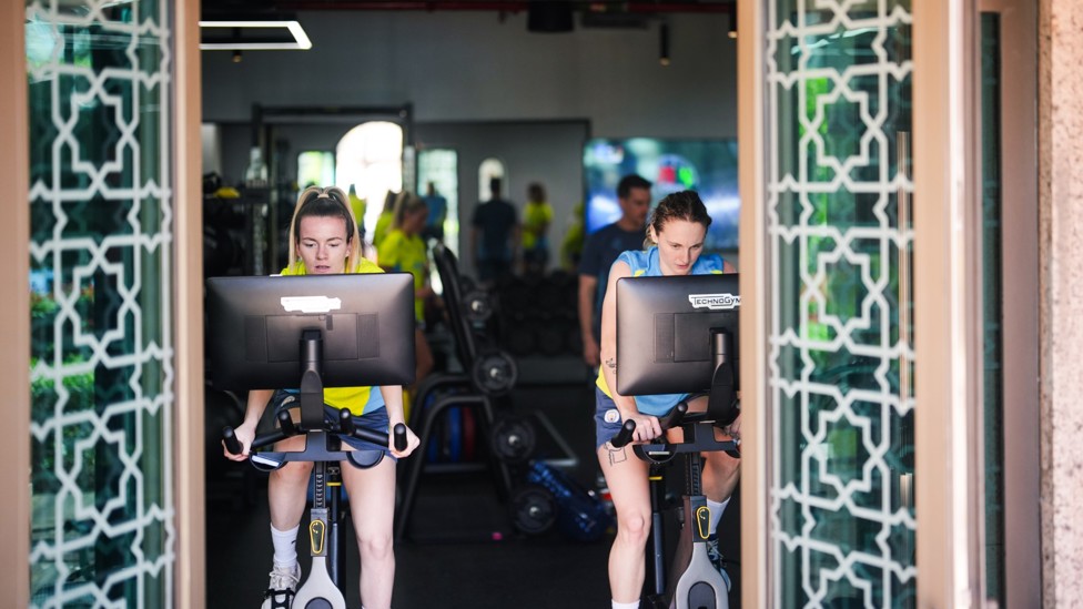 GYM WORK : Lauren Hemp and Katie Startup on the bike