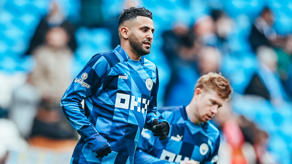 READY RIYAD : Going through the motions during the pre-match warm up.