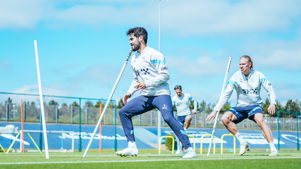 POLES APART : Ilkay and Erling are put through their paces