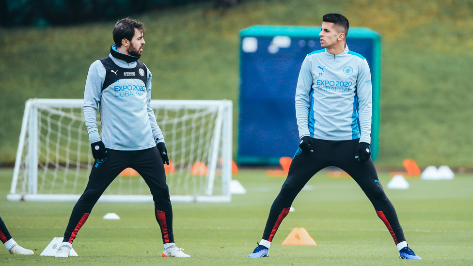 Portuguese duo Bernardo and Joao Cancelo have a quick chat