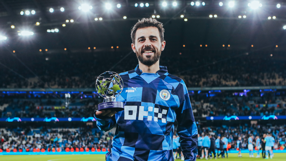 OUR MAN OF THE MATCH : Bernardo Silva poses with his award after a stand-out performance. 