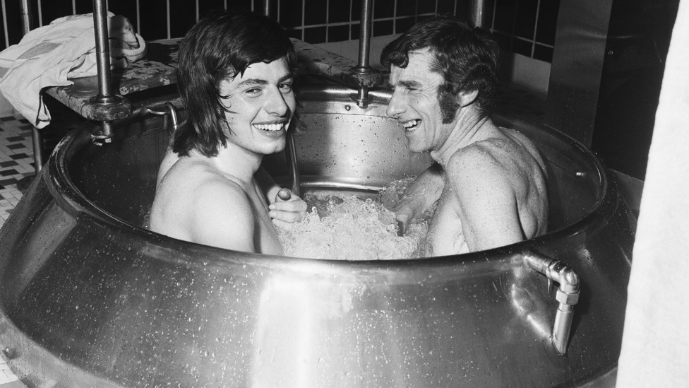 BATH TIME : Tony Book and Willie Donachie share an aero-tone tub in January 1973 after the Manchester City players were handed a surprise trip to the Derby Baths in Blackpool for a sauna