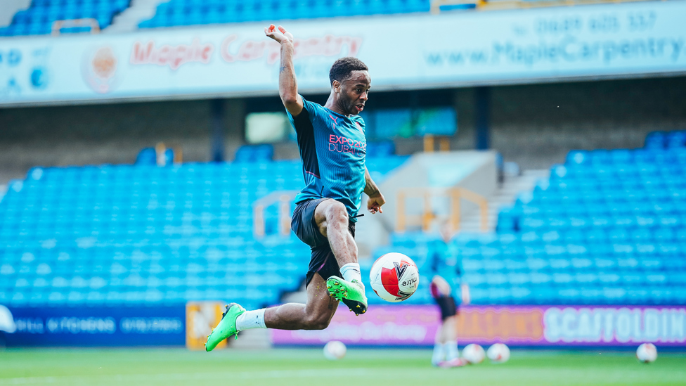 ON THE VOLLEY : Raheem Sterling meets a cross.