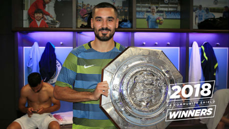 SILVER SALVO: Ilkay Gundogan proudly displays the Community Shield following Sunday's 2-0 win over Chelsea