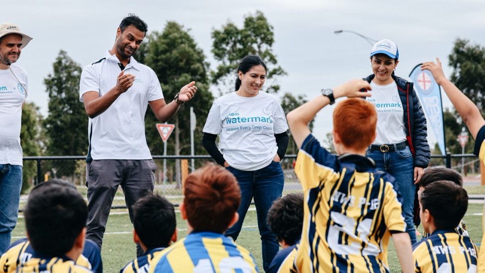 Volunteers from Xylem Australia attend a Football & Water Education festival with City in the Community Melbourne.