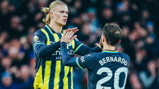 HIGH FIVE: Bernardo and Haaland celebrate.