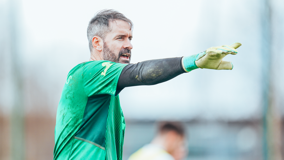 CARSON IN CONTROL : The goalkeeper gives his orders