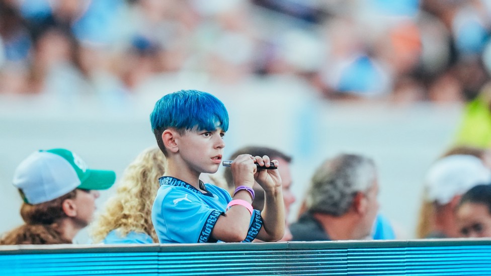 BLUE IS THE COLOUR : Incredible support from this young fan