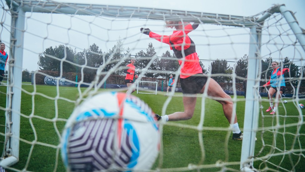 BACK OF THE NET : Laura Coombs finds the target