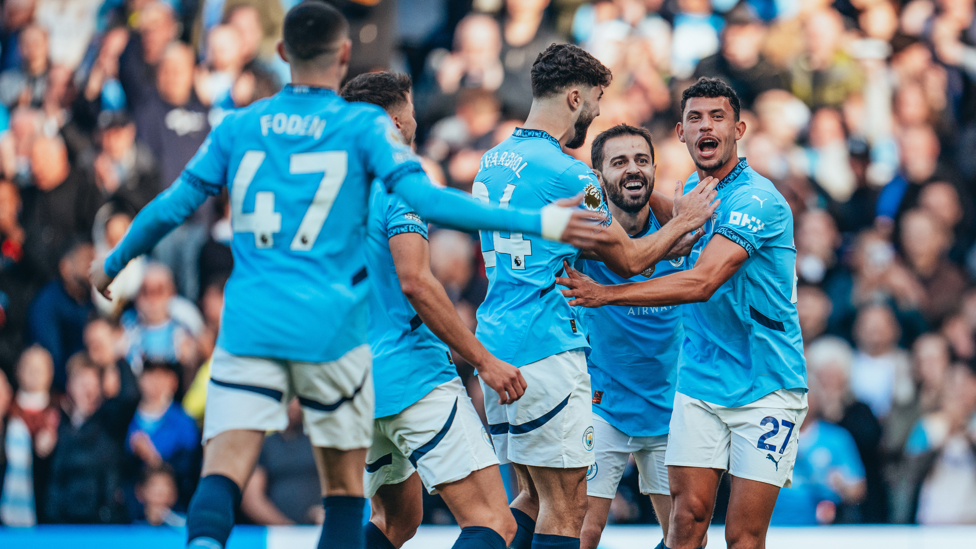 AWESOME ASSIST : Nunes feels the love after his role in the goal.