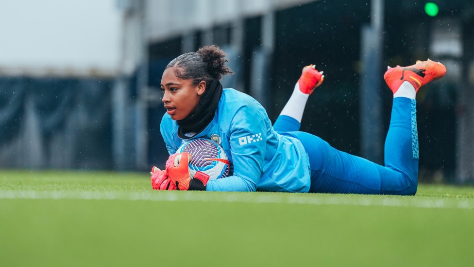 SAFE HANDS : Khiara Keating gets down to make the save