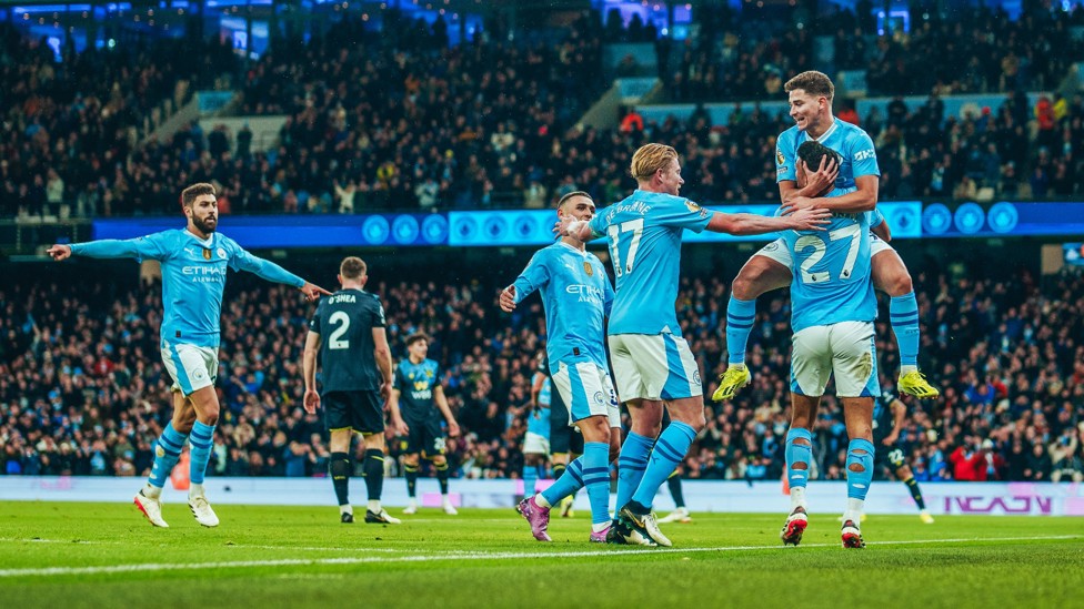 OPENER : Alvarez celebrates after his expert header.