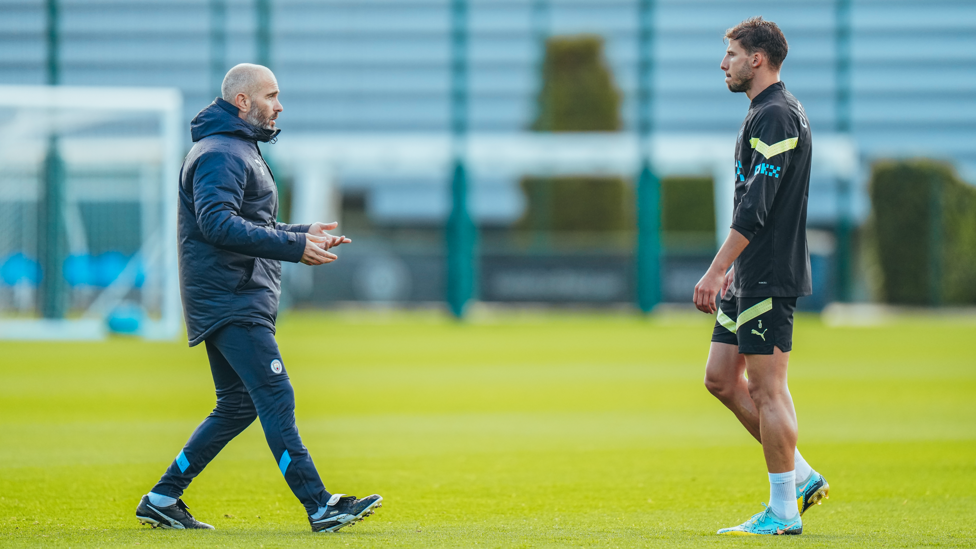 TALKING CITY: Coach Enzo Maresca chats with Ruben Dias