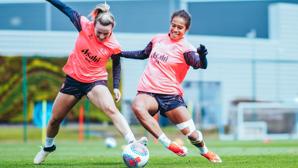 WING BATTLE : Lauren Hemp and Mary Fowler compete for the ball