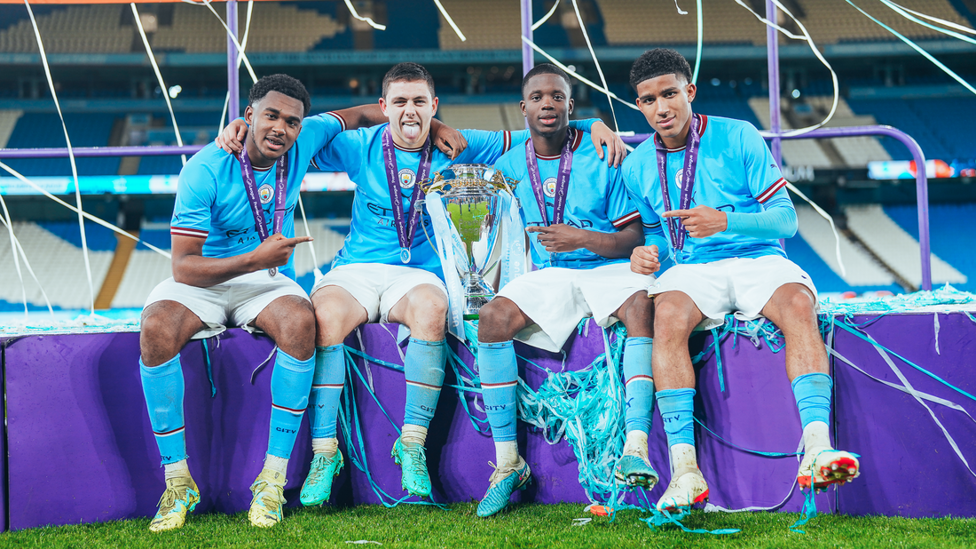 GROUP PIC : Isaiah Dada-Mascoll, Ashton Muir, Justin Oboavwoduo and Michael Okeke take a seat on the stage.  