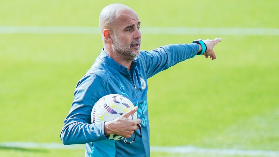 SHOWING THE WAY : Pep Guardiola takes charge