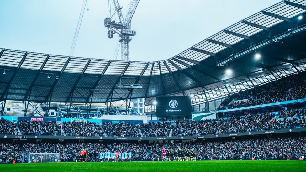 CITY REMEMBERS: The players and fans observe a period of silence to remember those we have lost this year