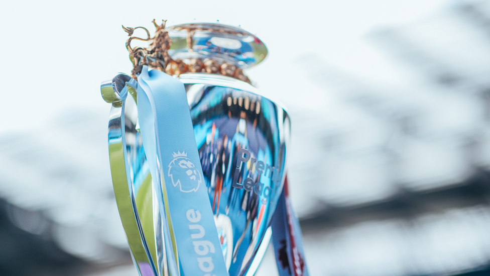 EYES ON THE PRIZE: The trophy sits on the touchline.