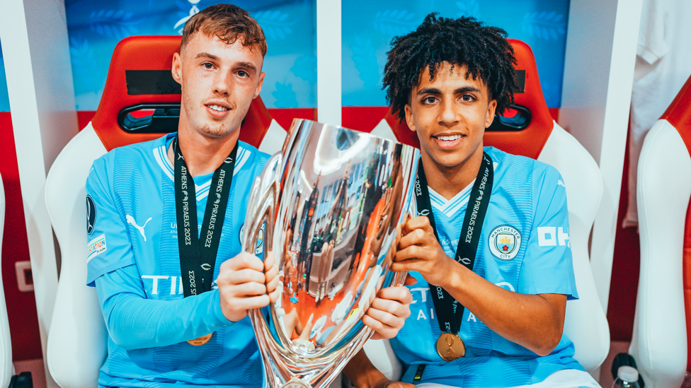 ACADEMY STARS : Palmer and Lewis show off the trophy.