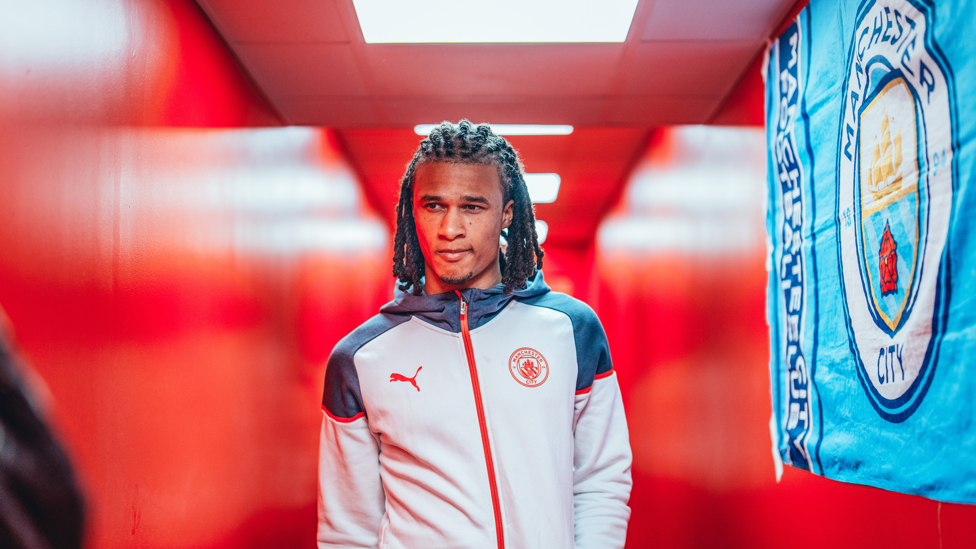 AKE ARRIVES : Nathan strolls towards the away dressing room.