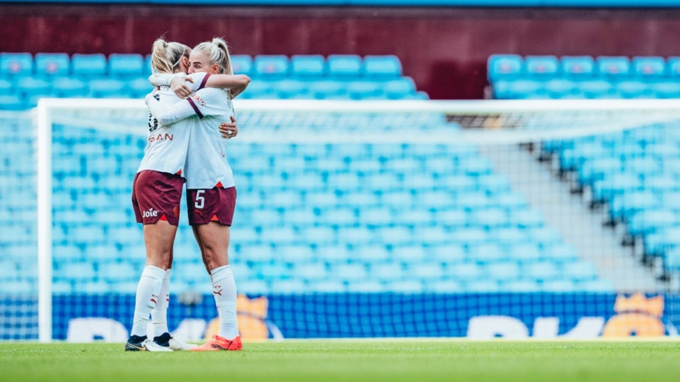 FINAL TIME : Steph Houghton gets a hug from Alex Greenwood at the full-time whistle